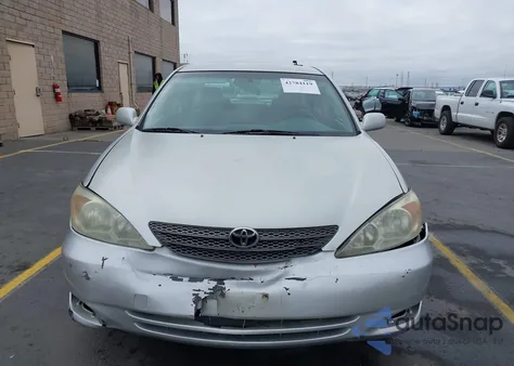 2002 Toyota Camry Le from USA, damaged, VIN JTDBE32K120075044